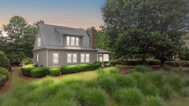 Welcome to this charming 3-bedroom, 3.5-bathroom Landing cottage on Reynolds Lake Oconee - The Landing in Georgia - for sale on GolfHomes.com, golf home, golf lot