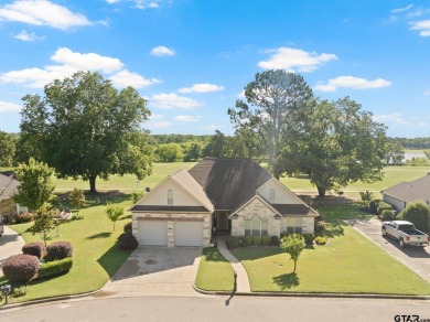 Welcome to your dream home in the charming, gated community of on Mount Pleasant Country Club in Texas - for sale on GolfHomes.com, golf home, golf lot