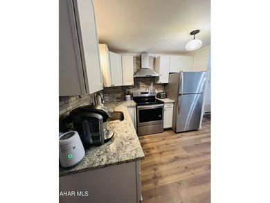 First floor!! 2 bed 2 bath unit in the Allegheny Mountains at on Blue Knob Rec Area Golf Course in Pennsylvania - for sale on GolfHomes.com, golf home, golf lot