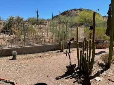 This spacious 4-bedroom, 2-bathroom home offers plenty of living on Gold Canyon Golf Resort - Sidewinder in Arizona - for sale on GolfHomes.com, golf home, golf lot