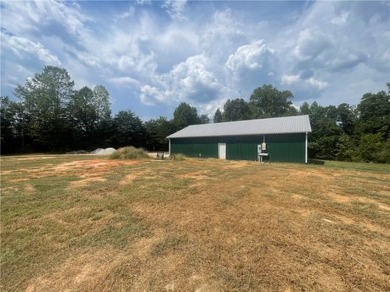 This 2.5-acre graded property, located near the Windsor at on Falcons Lair Golf Club in South Carolina - for sale on GolfHomes.com, golf home, golf lot