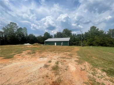 This 2.5-acre graded property, located near the Windsor at on Falcons Lair Golf Club in South Carolina - for sale on GolfHomes.com, golf home, golf lot