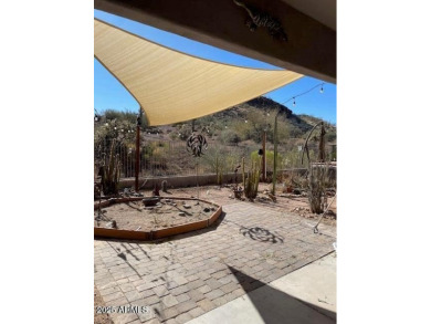 This spacious 4-bedroom, 2-bathroom home offers plenty of living on Gold Canyon Golf Resort - Sidewinder in Arizona - for sale on GolfHomes.com, golf home, golf lot