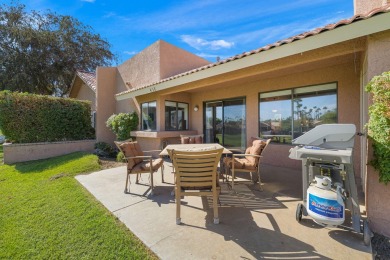 The charming courtyard gracefully lures you into this spacious on Oasis Country Club in California - for sale on GolfHomes.com, golf home, golf lot