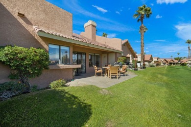 The charming courtyard gracefully lures you into this spacious on Oasis Country Club in California - for sale on GolfHomes.com, golf home, golf lot