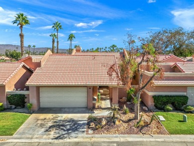 The charming courtyard gracefully lures you into this spacious on Oasis Country Club in California - for sale on GolfHomes.com, golf home, golf lot