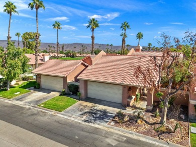 The charming courtyard gracefully lures you into this spacious on Oasis Country Club in California - for sale on GolfHomes.com, golf home, golf lot