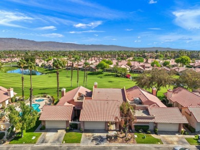 The charming courtyard gracefully lures you into this spacious on Oasis Country Club in California - for sale on GolfHomes.com, golf home, golf lot