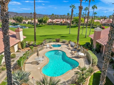 The charming courtyard gracefully lures you into this spacious on Oasis Country Club in California - for sale on GolfHomes.com, golf home, golf lot