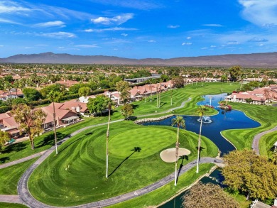 The charming courtyard gracefully lures you into this spacious on Oasis Country Club in California - for sale on GolfHomes.com, golf home, golf lot