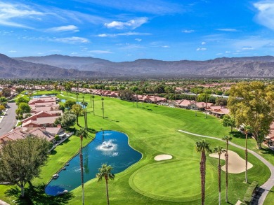 The charming courtyard gracefully lures you into this spacious on Oasis Country Club in California - for sale on GolfHomes.com, golf home, golf lot