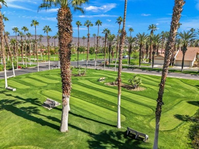 The charming courtyard gracefully lures you into this spacious on Oasis Country Club in California - for sale on GolfHomes.com, golf home, golf lot