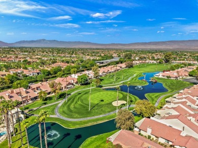 The charming courtyard gracefully lures you into this spacious on Oasis Country Club in California - for sale on GolfHomes.com, golf home, golf lot