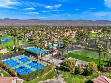 The charming courtyard gracefully lures you into this spacious on Oasis Country Club in California - for sale on GolfHomes.com, golf home, golf lot