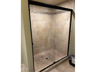 Experience luxury mountain living at its finest in this elegant on Gatlinburg Golf Course in Tennessee - for sale on GolfHomes.com, golf home, golf lot