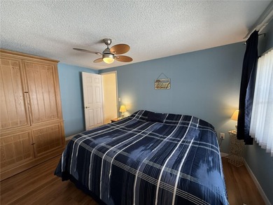 TWO BEDROOM, TWO BATHROOM MOBILE HOME IN ACTIVE 55+ COMMUNITY on River Run Golf Links in Florida - for sale on GolfHomes.com, golf home, golf lot