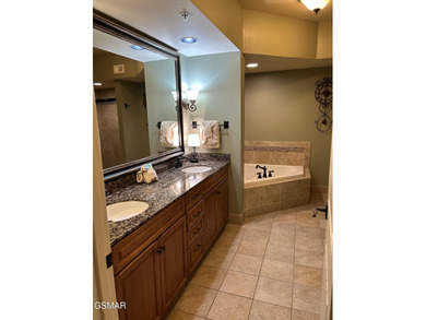 Experience luxury mountain living at its finest in this elegant on Gatlinburg Golf Course in Tennessee - for sale on GolfHomes.com, golf home, golf lot