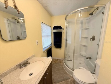 TWO BEDROOM, TWO BATHROOM MOBILE HOME IN ACTIVE 55+ COMMUNITY on River Run Golf Links in Florida - for sale on GolfHomes.com, golf home, golf lot