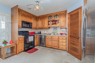 5.09 percent Assumable VA with Roam! Upgraded roof (2022) and a on Sandy Ridge Country Club in North Carolina - for sale on GolfHomes.com, golf home, golf lot