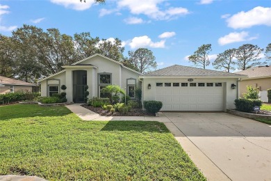 This 3-bedroom former model home sits on Hole 2 of Harbor Hills on Harbor Hills Country Club in Florida - for sale on GolfHomes.com, golf home, golf lot