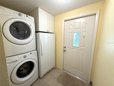 TWO BEDROOM, TWO BATHROOM MOBILE HOME IN ACTIVE 55+ COMMUNITY on River Run Golf Links in Florida - for sale on GolfHomes.com, golf home, golf lot