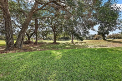 This 3-bedroom former model home sits on Hole 2 of Harbor Hills on Harbor Hills Country Club in Florida - for sale on GolfHomes.com, golf home, golf lot