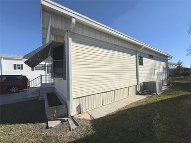 TWO BEDROOM, TWO BATHROOM MOBILE HOME IN ACTIVE 55+ COMMUNITY on River Run Golf Links in Florida - for sale on GolfHomes.com, golf home, golf lot