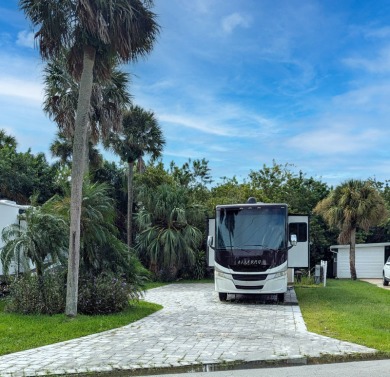 Located in an exclusive gated community with a championship on The Great Outdoors Golf and Country Club in Florida - for sale on GolfHomes.com, golf home, golf lot