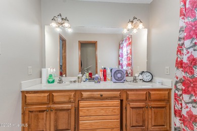 5.09 percent Assumable VA with Roam! Upgraded roof (2022) and a on Sandy Ridge Country Club in North Carolina - for sale on GolfHomes.com, golf home, golf lot