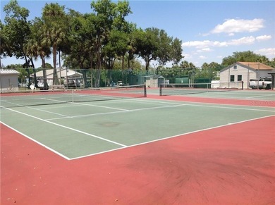 TWO BEDROOM, TWO BATHROOM MOBILE HOME IN ACTIVE 55+ COMMUNITY on River Run Golf Links in Florida - for sale on GolfHomes.com, golf home, golf lot