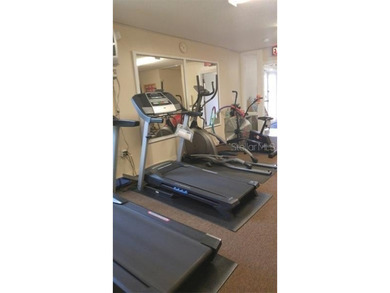 TWO BEDROOM, TWO BATHROOM MOBILE HOME IN ACTIVE 55+ COMMUNITY on River Run Golf Links in Florida - for sale on GolfHomes.com, golf home, golf lot