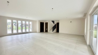 Experience refined living in this stunning home located in the on  in  - for sale on GolfHomes.com, golf home, golf lot