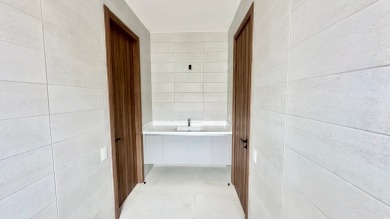 Experience refined living in this stunning home located in the on  in  - for sale on GolfHomes.com, golf home, golf lot
