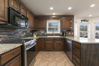 ''Move-in ready'' is an understatement for 209 Northgate in on Windmill Ridge Golf Course in Missouri - for sale on GolfHomes.com, golf home, golf lot