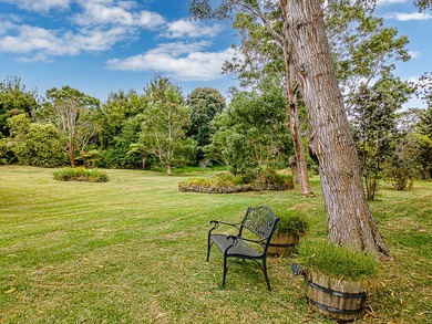 This recently remodeled two bedroom, two bath cabin is a on Volcano Golf and Country Club in Hawaii - for sale on GolfHomes.com, golf home, golf lot