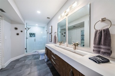 Come check out this desirable first floor furnished designer on Isla Del Sol Yacht and Country Club in Florida - for sale on GolfHomes.com, golf home, golf lot