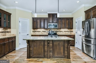 THIS SPACIOUS FOUR-BEDROOM HOME OFFERS OVER 2,700 SQUARE FEET OF on Laurel Island Links in Georgia - for sale on GolfHomes.com, golf home, golf lot
