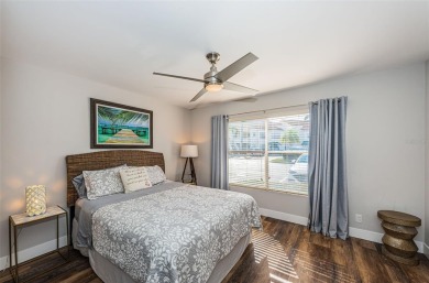 Come check out this desirable first floor furnished designer on Isla Del Sol Yacht and Country Club in Florida - for sale on GolfHomes.com, golf home, golf lot
