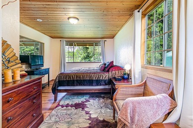 This recently remodeled two bedroom, two bath cabin is a on Volcano Golf and Country Club in Hawaii - for sale on GolfHomes.com, golf home, golf lot