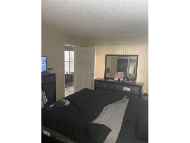 This beautifully updated 2-bedroom, 2-bath condo in Silver on Country Club At Silver Springs Shores in Florida - for sale on GolfHomes.com, golf home, golf lot