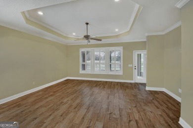 THIS SPACIOUS FOUR-BEDROOM HOME OFFERS OVER 2,700 SQUARE FEET OF on Laurel Island Links in Georgia - for sale on GolfHomes.com, golf home, golf lot