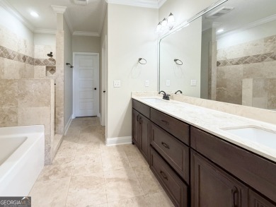 THIS SPACIOUS FOUR-BEDROOM HOME OFFERS OVER 2,700 SQUARE FEET OF on Laurel Island Links in Georgia - for sale on GolfHomes.com, golf home, golf lot