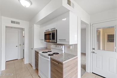 Stylish updates, golf course living, and worry-free big-ticket on Pebblebrook Golf Course in Arizona - for sale on GolfHomes.com, golf home, golf lot