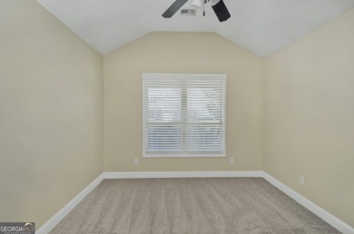 THIS SPACIOUS FOUR-BEDROOM HOME OFFERS OVER 2,700 SQUARE FEET OF on Laurel Island Links in Georgia - for sale on GolfHomes.com, golf home, golf lot