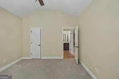 THIS SPACIOUS FOUR-BEDROOM HOME OFFERS OVER 2,700 SQUARE FEET OF on Laurel Island Links in Georgia - for sale on GolfHomes.com, golf home, golf lot