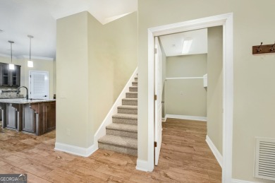 THIS SPACIOUS FOUR-BEDROOM HOME OFFERS OVER 2,700 SQUARE FEET OF on Laurel Island Links in Georgia - for sale on GolfHomes.com, golf home, golf lot