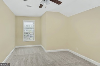 THIS SPACIOUS FOUR-BEDROOM HOME OFFERS OVER 2,700 SQUARE FEET OF on Laurel Island Links in Georgia - for sale on GolfHomes.com, golf home, golf lot