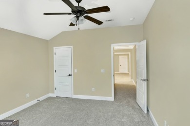 THIS SPACIOUS FOUR-BEDROOM HOME OFFERS OVER 2,700 SQUARE FEET OF on Laurel Island Links in Georgia - for sale on GolfHomes.com, golf home, golf lot