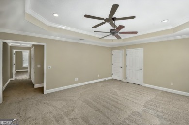 THIS SPACIOUS FOUR-BEDROOM HOME OFFERS OVER 2,700 SQUARE FEET OF on Laurel Island Links in Georgia - for sale on GolfHomes.com, golf home, golf lot