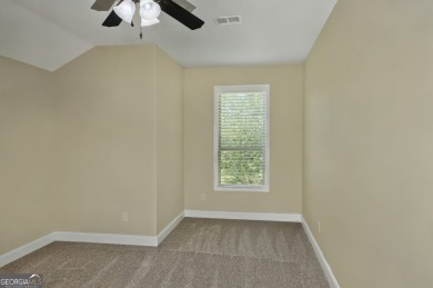 THIS SPACIOUS FOUR-BEDROOM HOME OFFERS OVER 2,700 SQUARE FEET OF on Laurel Island Links in Georgia - for sale on GolfHomes.com, golf home, golf lot